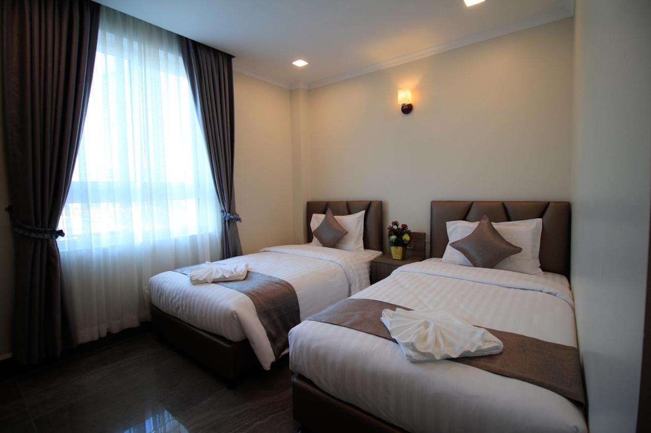 Tphd Hotel And Apartment Phnom Penh Bagian luar foto